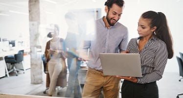 Two Global HR professionals having a meeting in an office